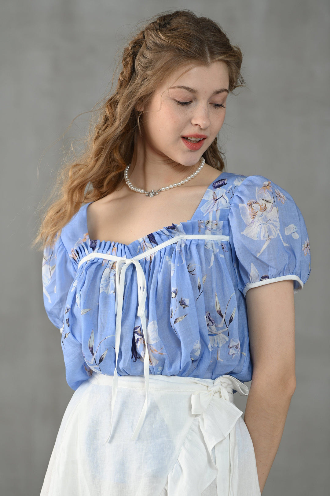 Daisy 33 | blue floral linen blouse